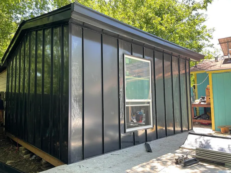 Black standing seam metal wall panels for Metal Roof Installation in Saco