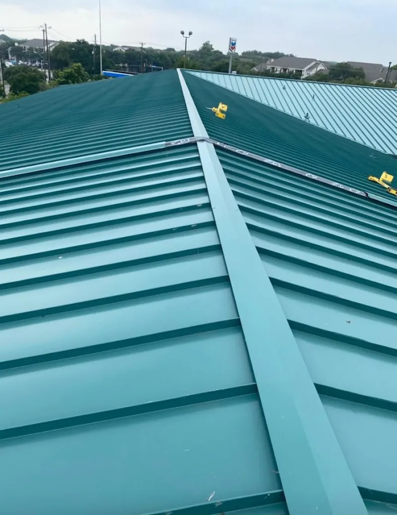 Green commercial metal roof ridge and valley for Metal Roof Repair in Saco